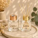 2xTransparant-parfumflesje-met-gouden-dop.webp